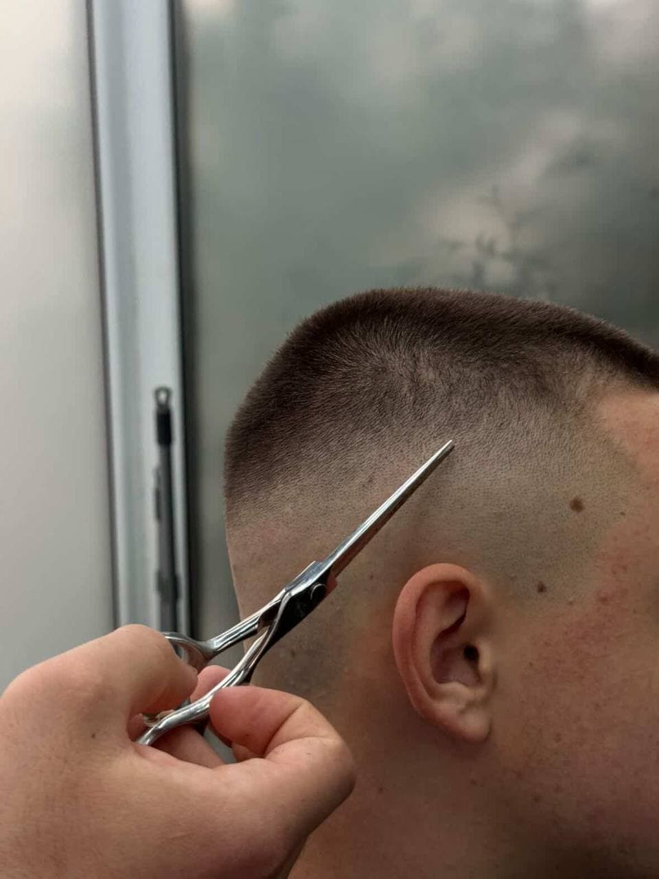 Scissors precision on a skin fade